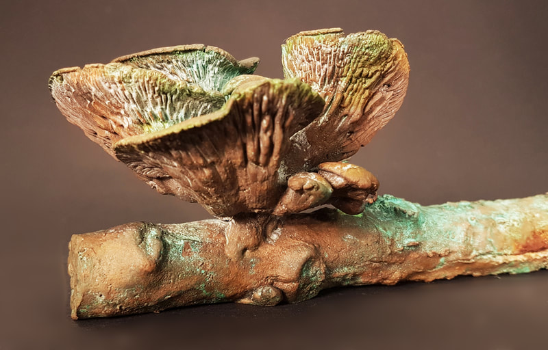paddenstoel takje - bronzen beeld - kunst - amsterdam